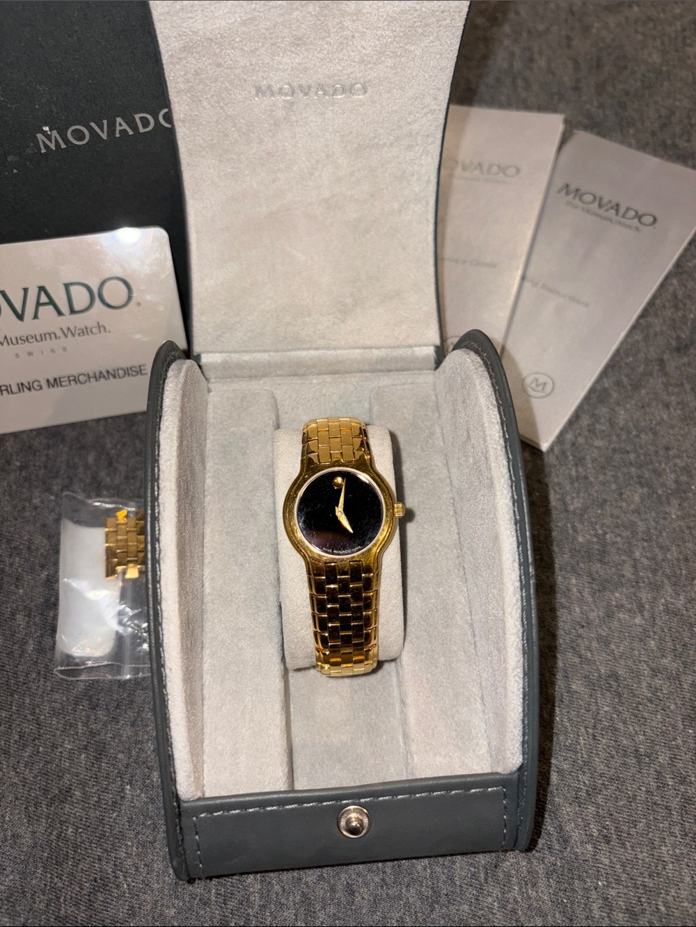 Womens Movado designer watch w grey case & box w logo jewelry watches slim band